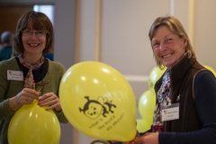 Sylvia Clayden (L) and Vicki Lowes (R) preparing balloons to give away to children at the Wiltshire Bee & Honey Day 2019