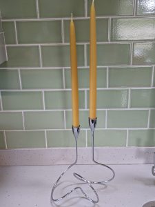 Dipped candles in elegant candle holder